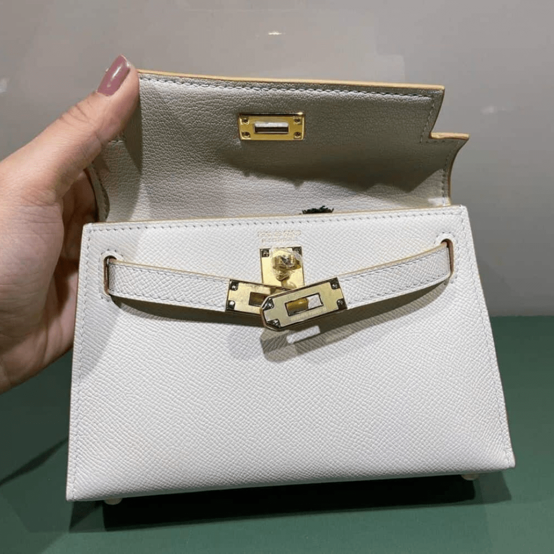 Hermès Kelly 20 Tasche mit goldener Hardware in Offwhite