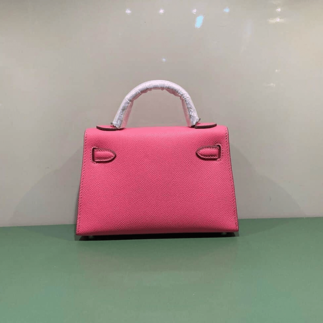 Hermès Kelly 20 Tasche mit goldener Hardware in Rosa